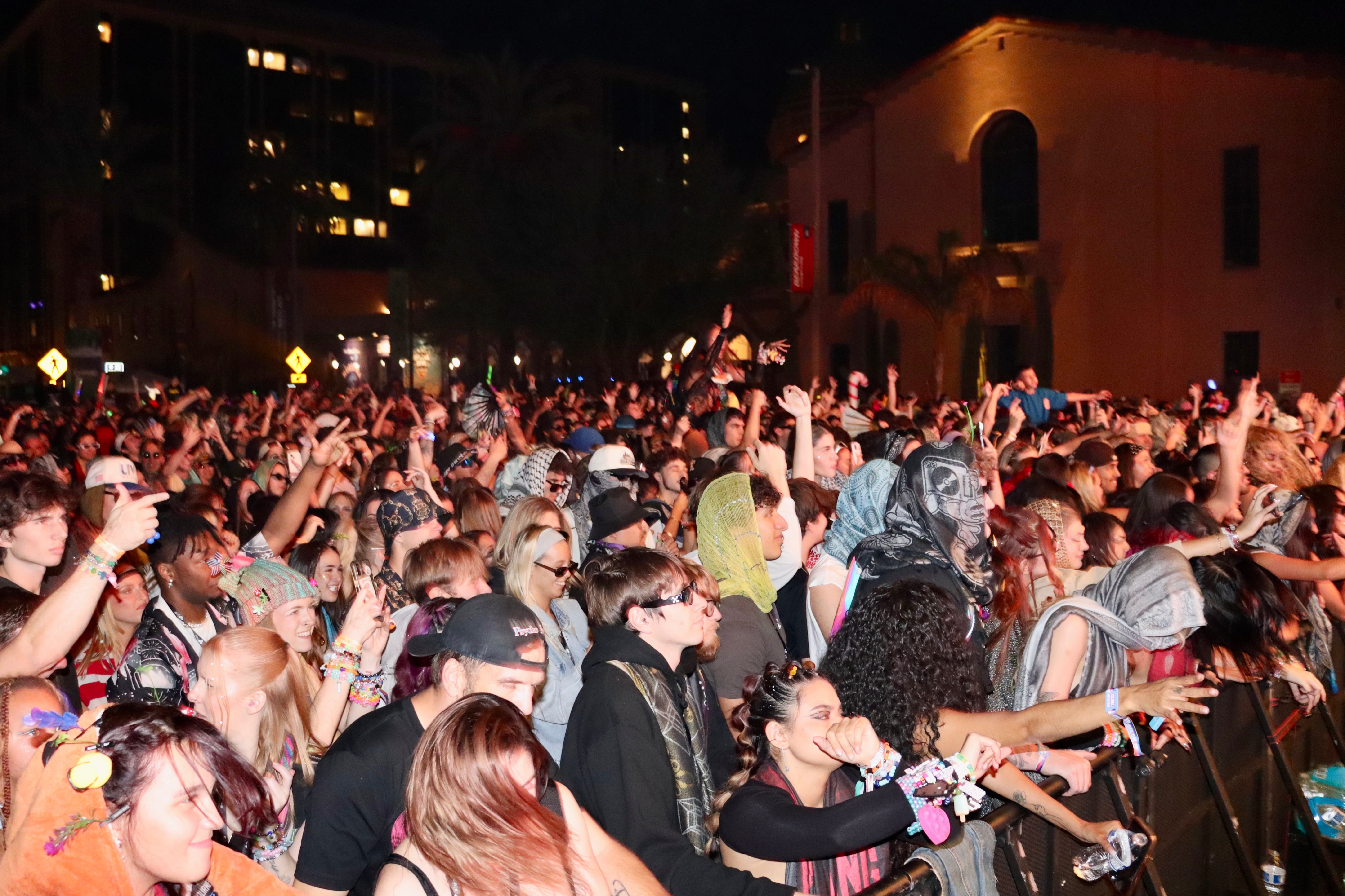Crowd riding the rail during a Levity set